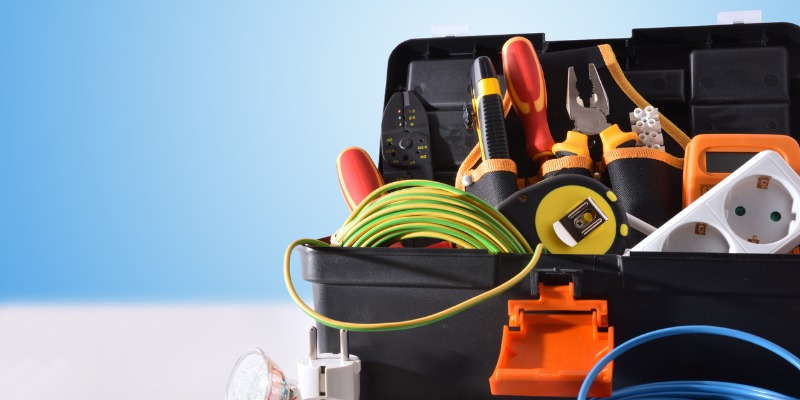toolbox with cables and tools